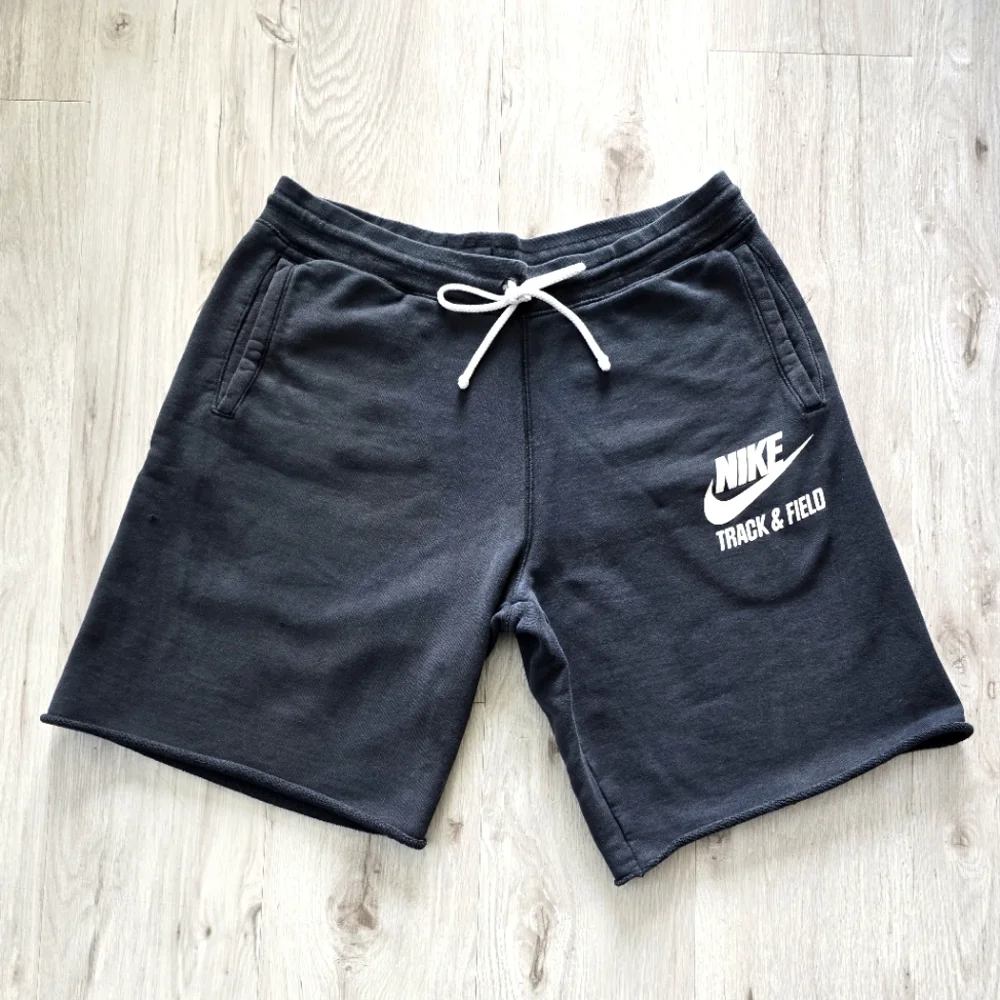 Nike | black cotton blend track & field sporty activewear shorts | MENS L - Picture 1 of 10
